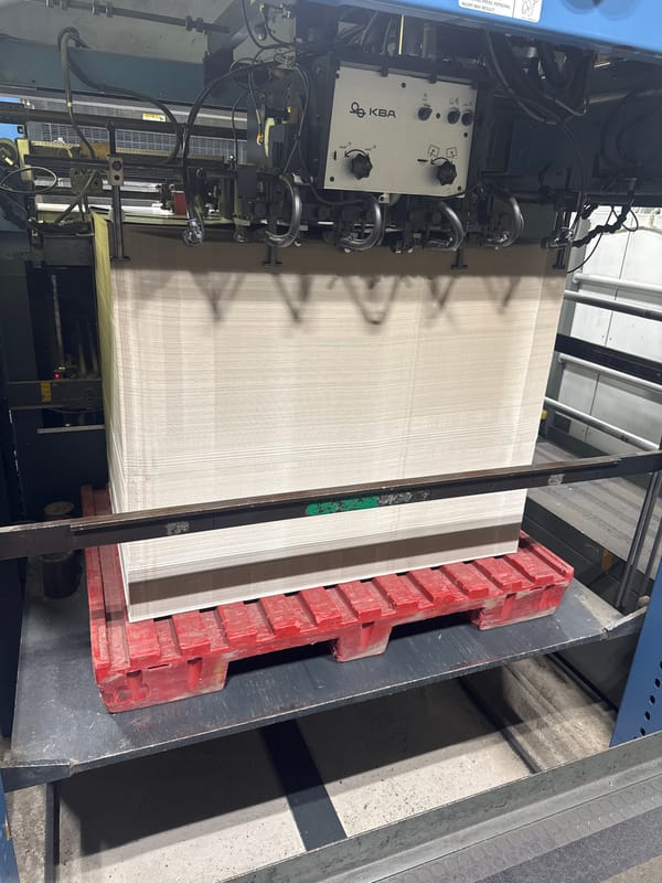 Industrial printing press in action at Jeffersontown facility
