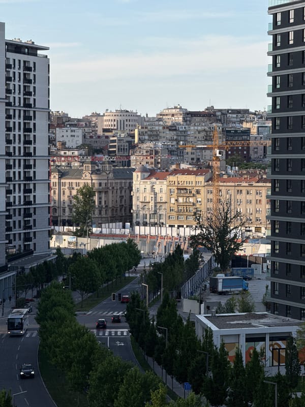 Urban life captured around Belgrade parking garage entrance