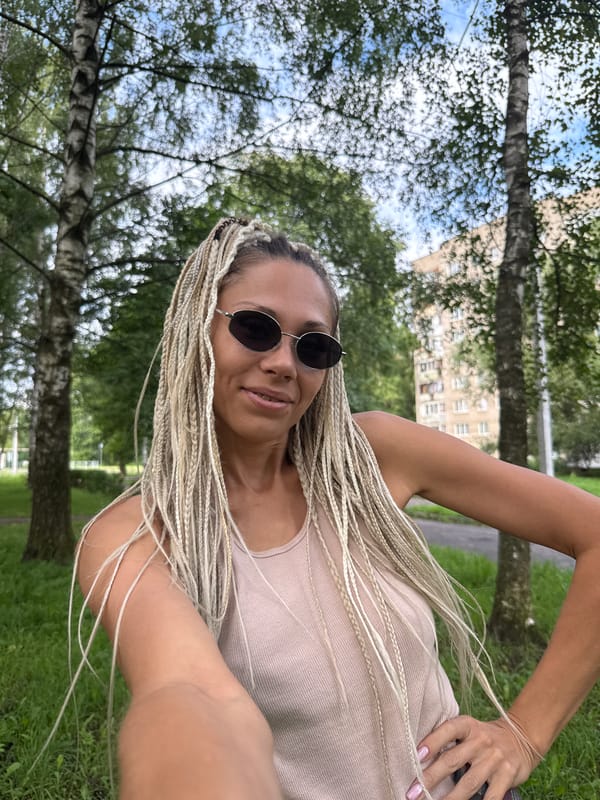 Park selfies and moody lit portraits across a summer afternoon