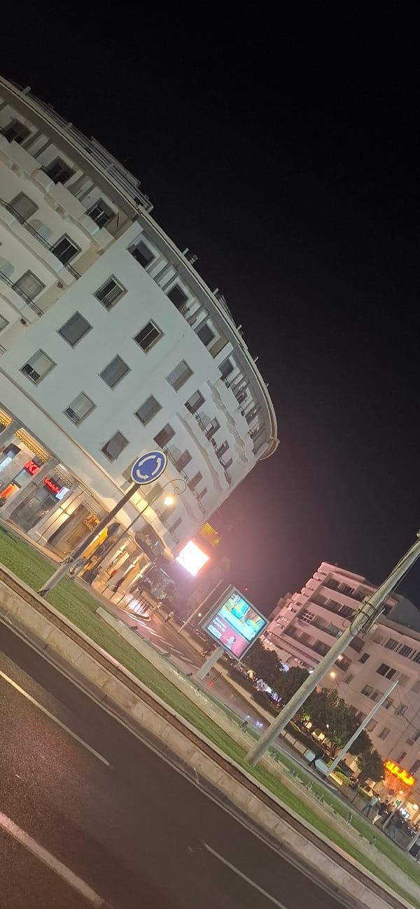 Nighttime street scenes captured in illuminated Rabat, Morocco