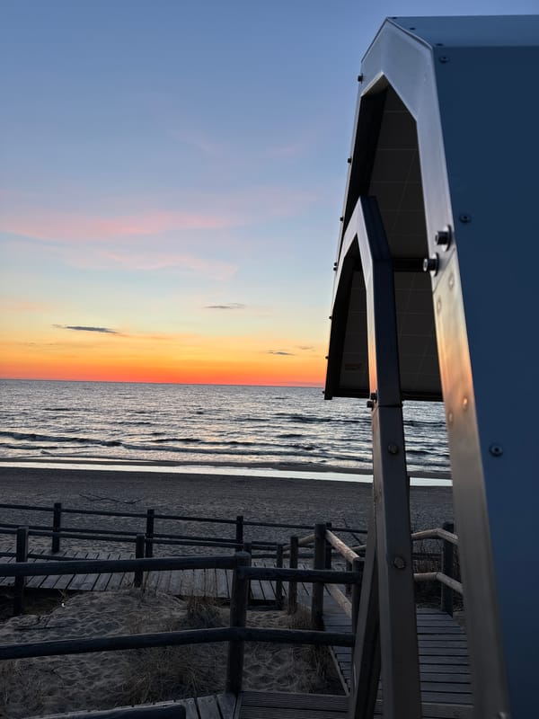 Sunset documented at Carnikava beach, Latvia with handstand performer