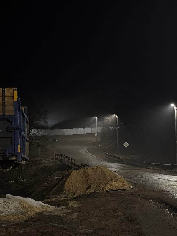 Foggy night scene documented along roadside in Rusalevka, Russia