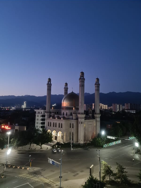 Almaty's Central Mosque glows at dusk and into the night