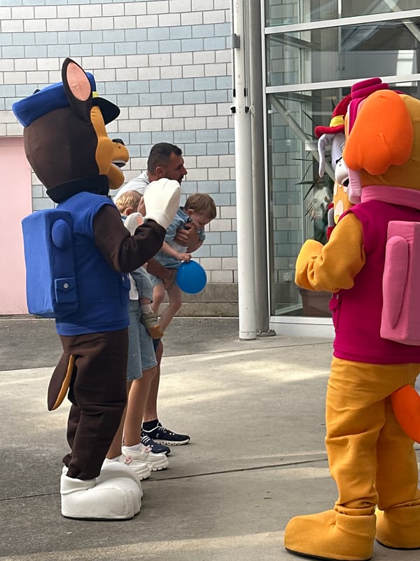 Paw Patrol mascots entertain families at outdoor meet-and-greet event