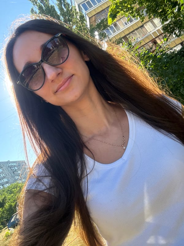 Sunny afternoon stroll through a Kyiv park, summer 2026