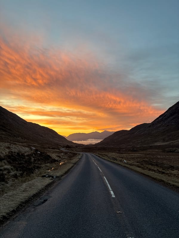 Mountain road captured at sunset near Fort William