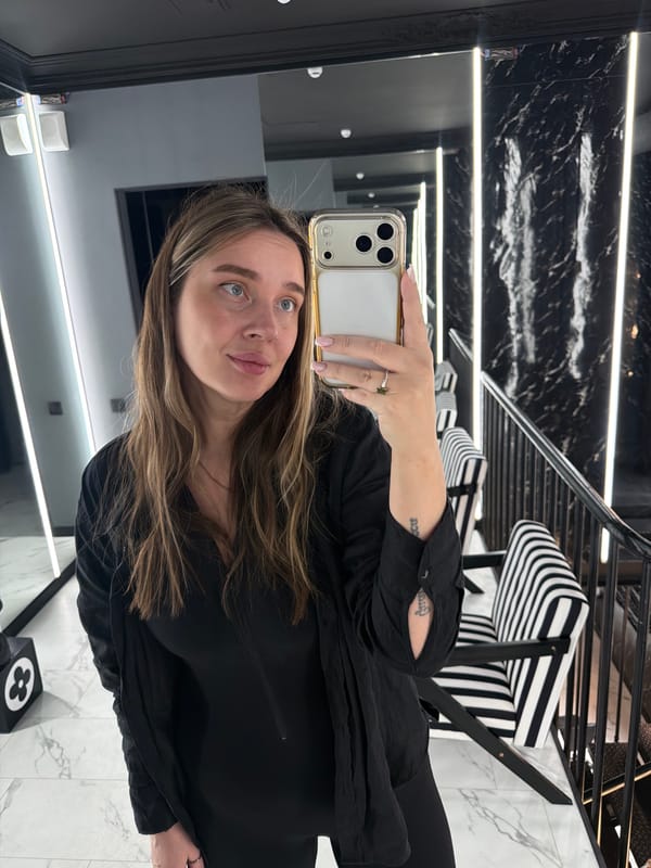 Woman takes mirror selfie in Moscow apartment