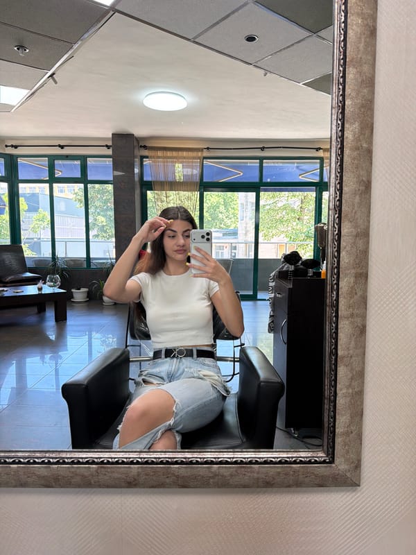 Woman takes selfies at salon and BMW in Gabrovo