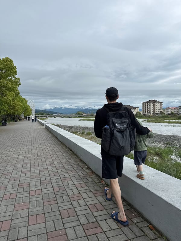 Family visits WWII memorial in Sochi amid overcast skies