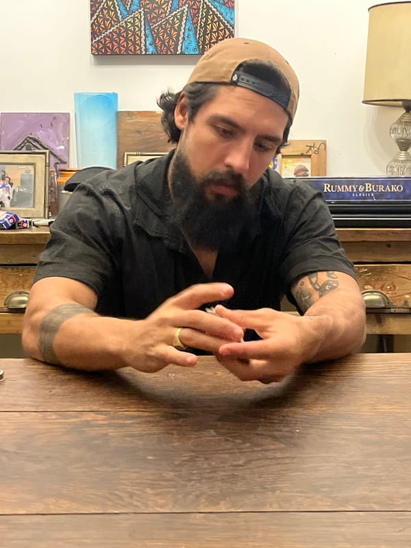 Man films playful moments with dog on couch in Argentina