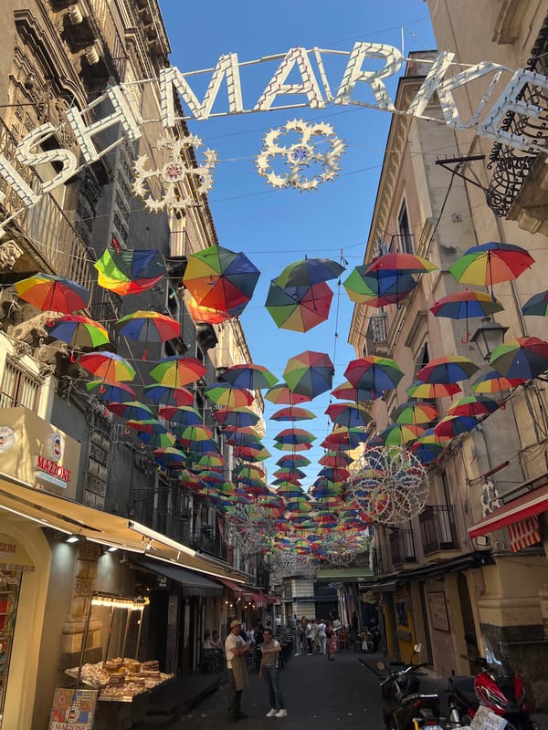 Catania's baroque center and street market on a summer afternoon