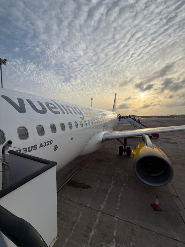Passengers board a Vueling A320 at Barcelona–El Prat Airport