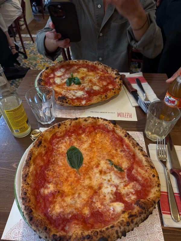 Neapolitan pizzas on the table at Pizzium, Milan