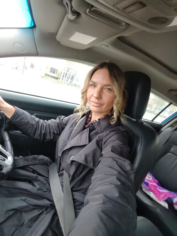 Woman takes car selfies in Petropavlovsk-Kamchatsky