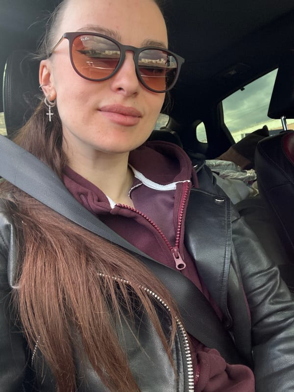 Person observed in vehicle in Krasnoyarsk parking area