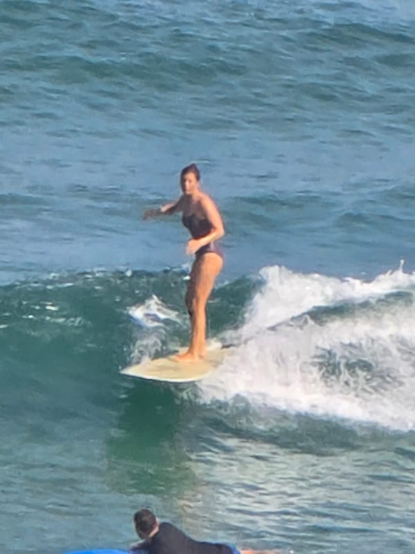 Early morning surfing and diving activity observed in Tel Aviv waters