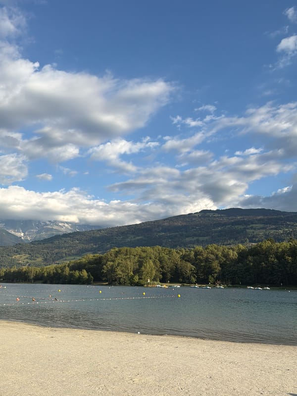 Calm summer afternoon at Lake Passy's sandy beach