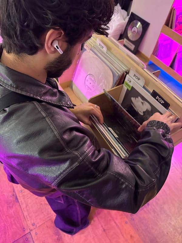 Man browses vinyl records at Yerevan record store