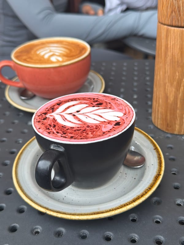 London cafe patrons enjoy latte art during morning coffee