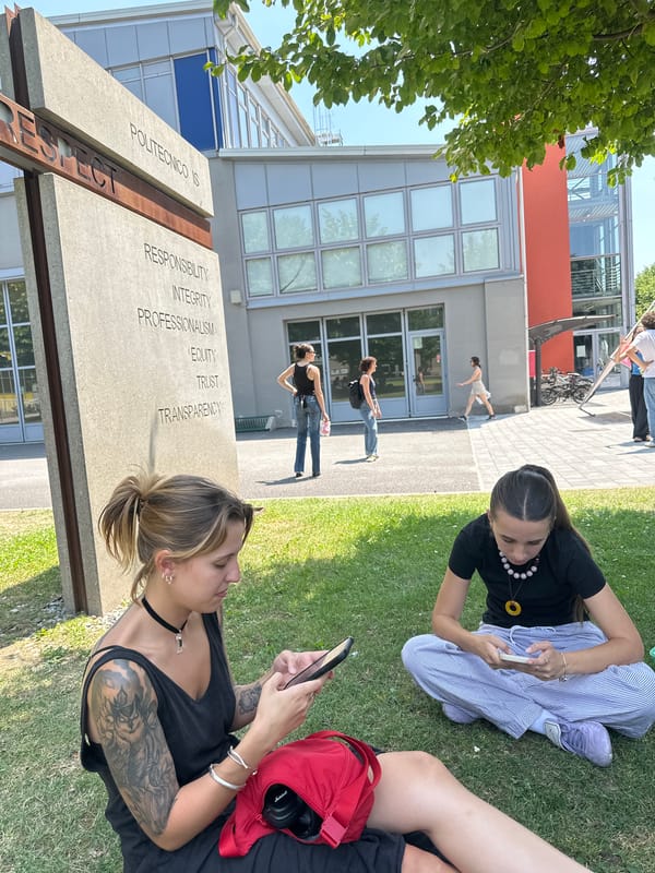 Sunny afternoon hangout on the grass at Politecnico di Milano