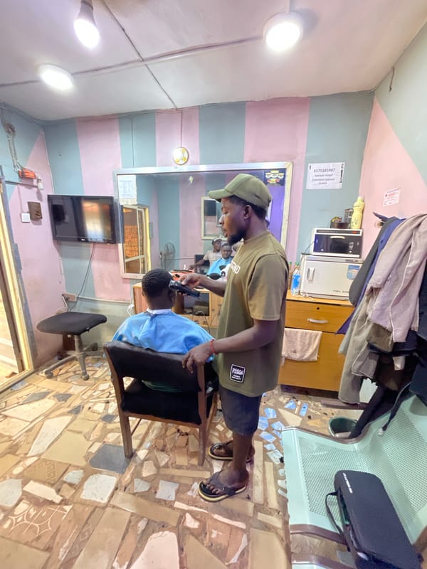Routine haircut service documented at Onitsha barbershop