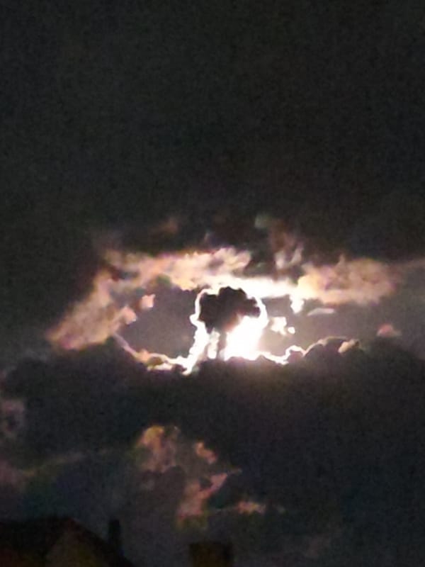 Full moon creates dramatic cloudy night display over Burgas