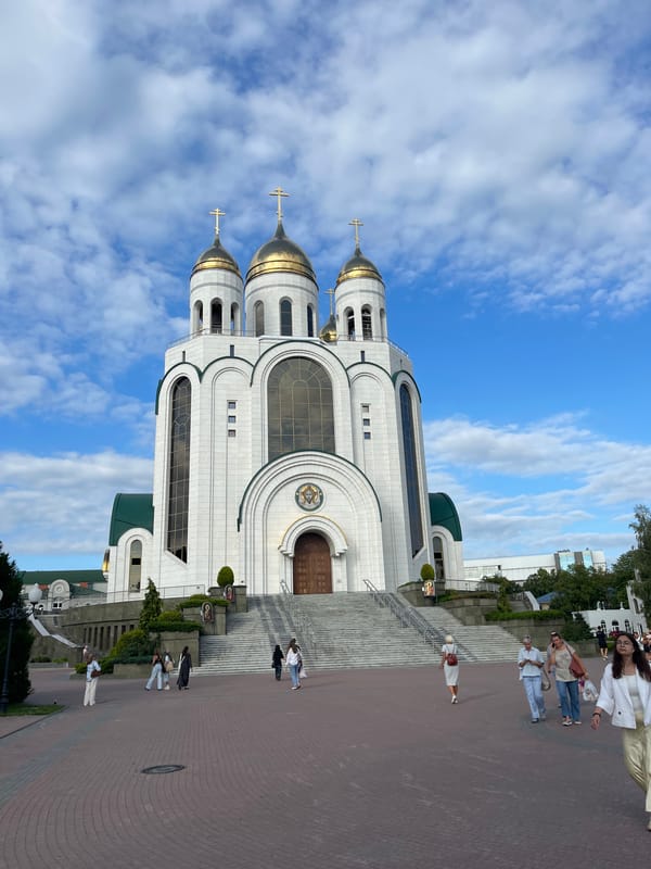 Street market and churches along Kaliningrad's brick-paved walkways