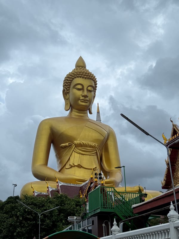 Bangkok's Wat Paknam golden Buddha, seen from land and canal