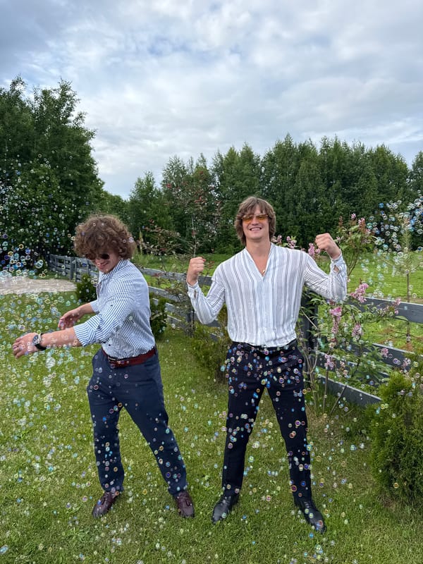 Group Creates Soap Bubbles During Outdoor Photo Session in Perm