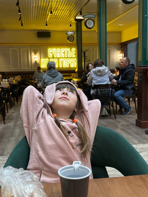 Child in pink bunny hoodie observed at Bolshoye Savino venue