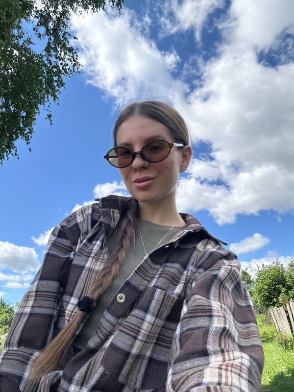 Outdoor selfies in a Russian field on a cloudy morning