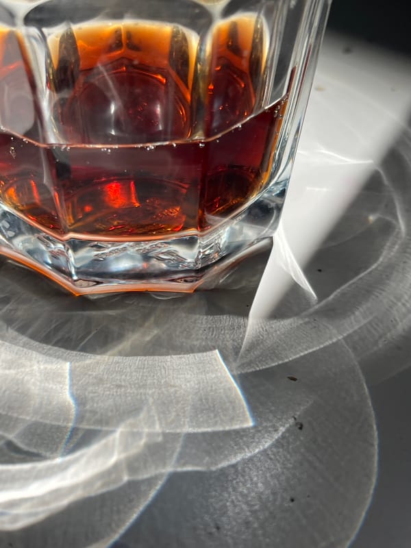 Quiet morning moments captured in Picassent home with drinks, prisms