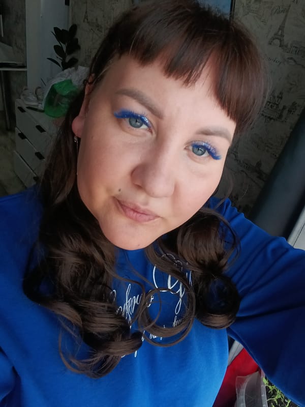 Woman takes selfie in Osa, Russia early morning