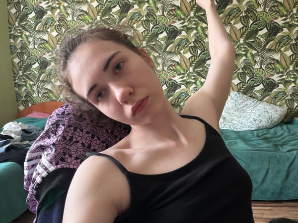 Quick selfie series inside a tropical-wallpapered room in Zavodoukovsk