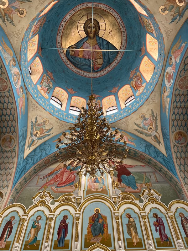 Visitor documents historic Russian Orthodox church in Kargapolye