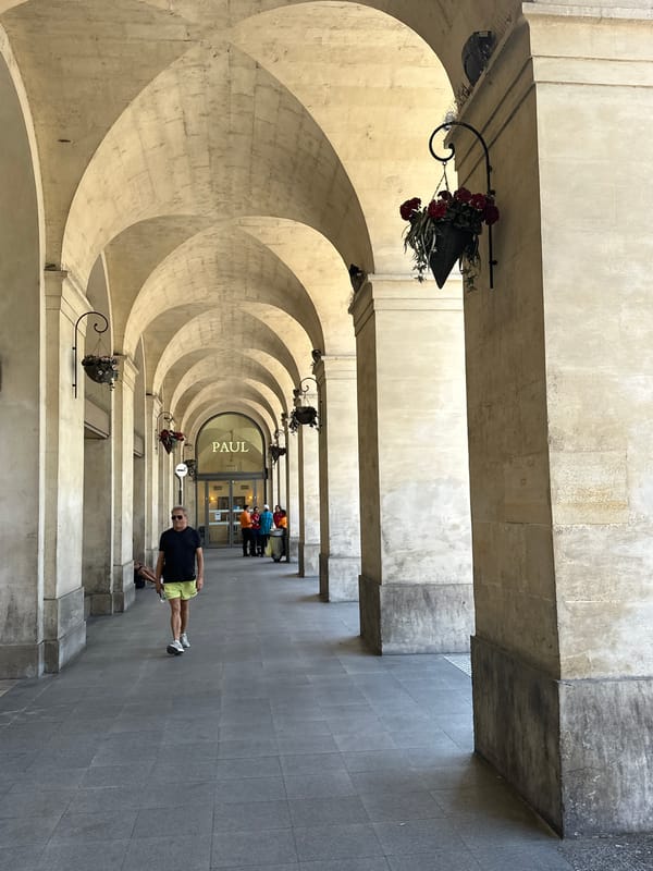 Wandering Nîmes' Roman arcades and stone streets at midday