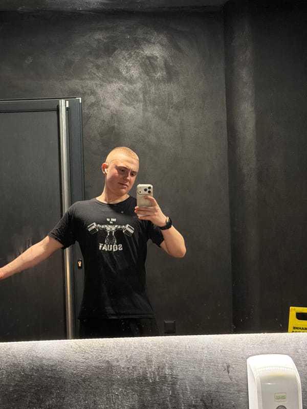 Mirror selfie taken in dark bathroom in Burgas