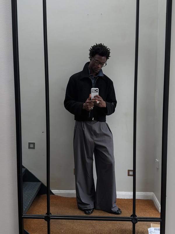 Man takes selfie in front of mirror in London