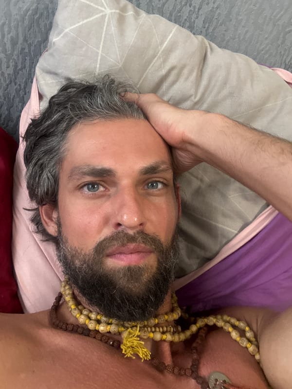 Lazy morning selfie session in a Saint Petersburg bedroom