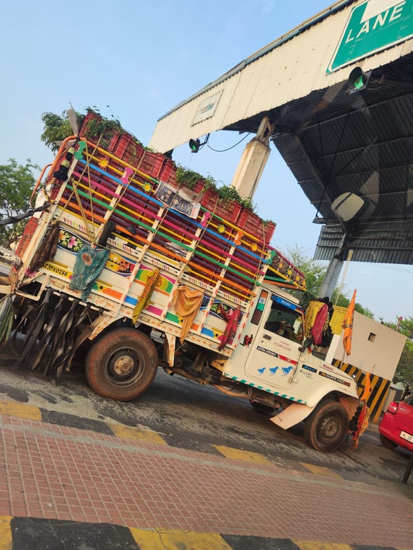 Decorated pickup truck loaded with red crates spotted in Narepalli