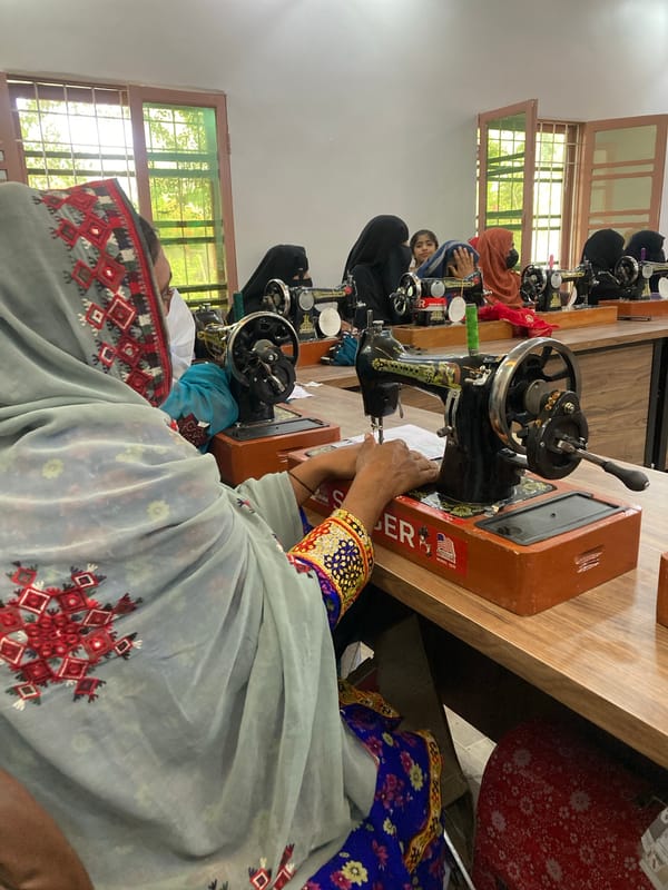 Women attend sewing training session in Rāwāni, Pakistan