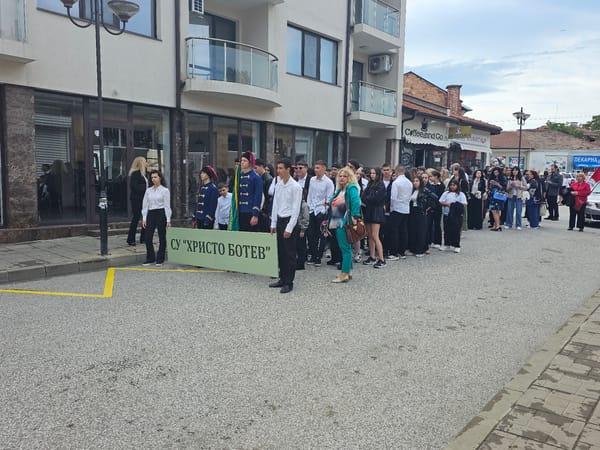 Students march through Karnobat streets in formal procession