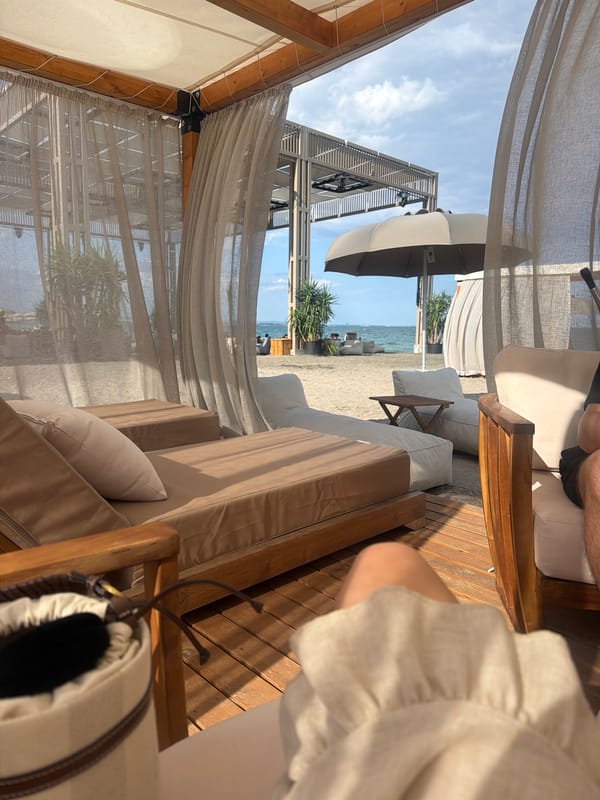 Chilling at a beach club cabana on a sunny afternoon