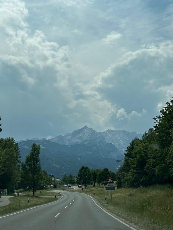 Morning in Garmisch: Alpine roads, Zugspitze views, and a gold monkey