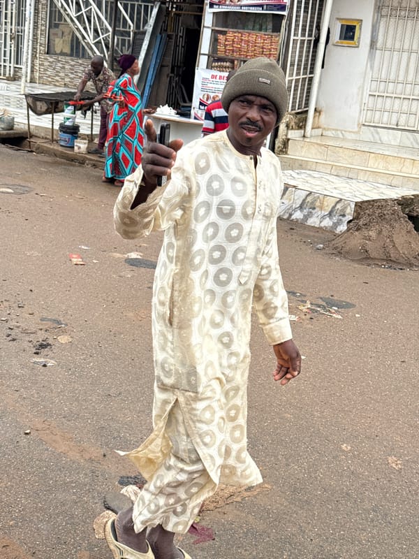 Morning street life in a busy Abuja market district