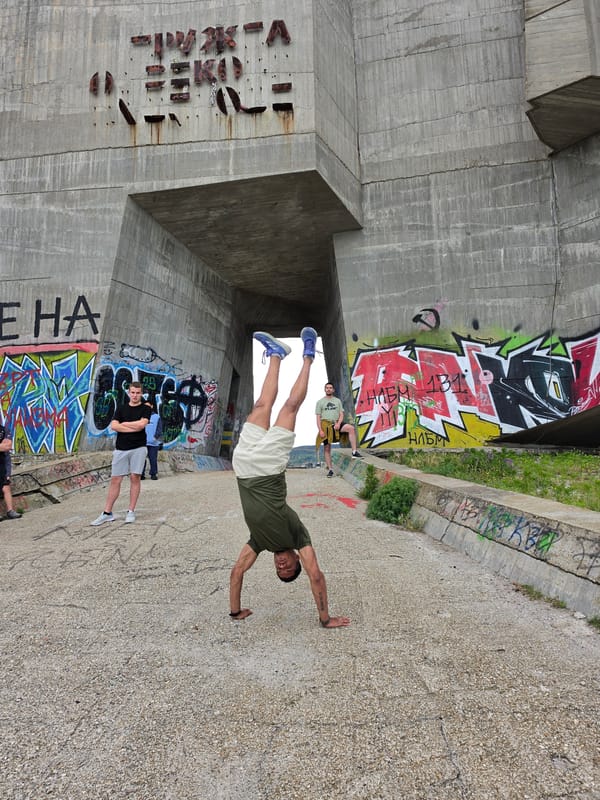 Young visitors perform parkour at Communist monument in Varna
