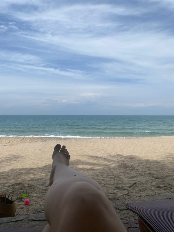 Family enjoys morning beach resort time in Vietnam