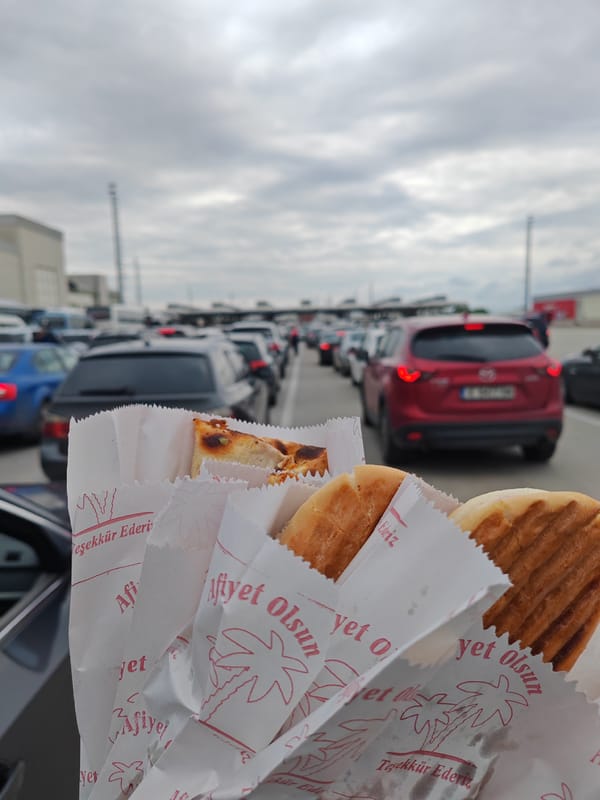 Traveler documents sandwich meal in vehicle at Bulgarian border town