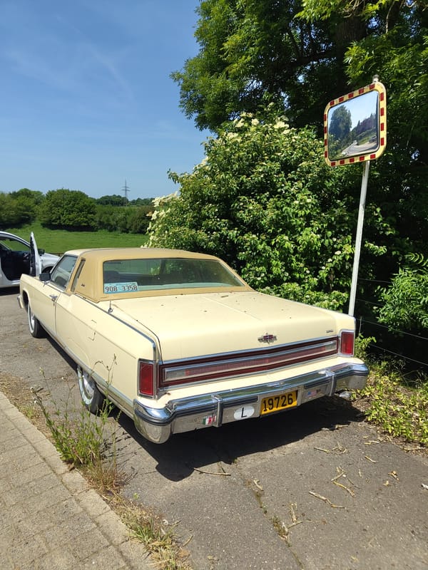 Vintage car spotted parked on roadside in Goeblange, Luxembourg