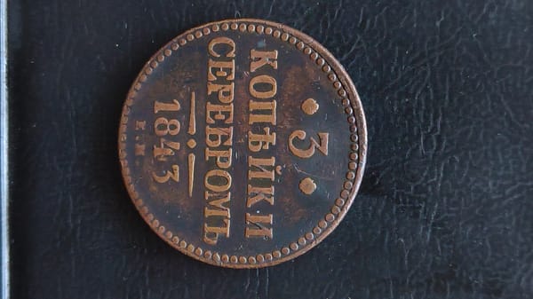 Historic coins and medals from multiple eras laid out in Sumgayit